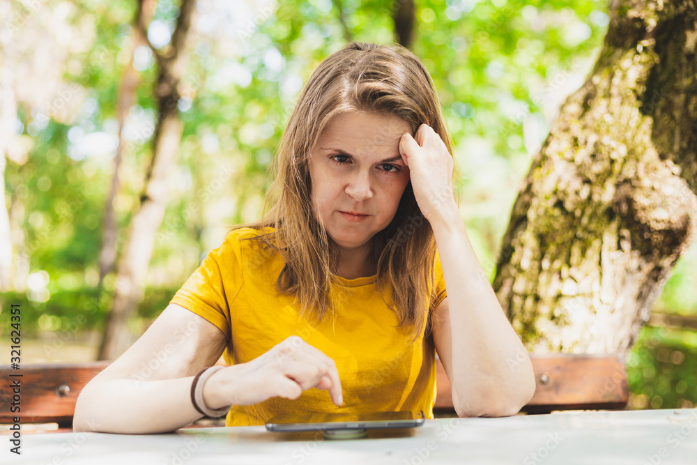 Woman using mobile phone outside Woman using mobile phone outside