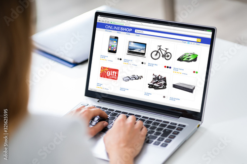 Businessperson Doing Online Shopping On Laptop