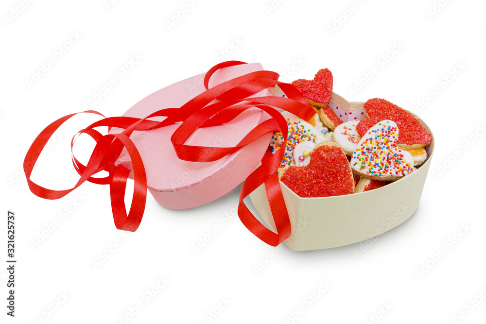 Heart shaped cookies and pink ribbon in box isolated on white background with clipping path Heart shaped cookies and pink ribbon in box isolated on white background with clipping path