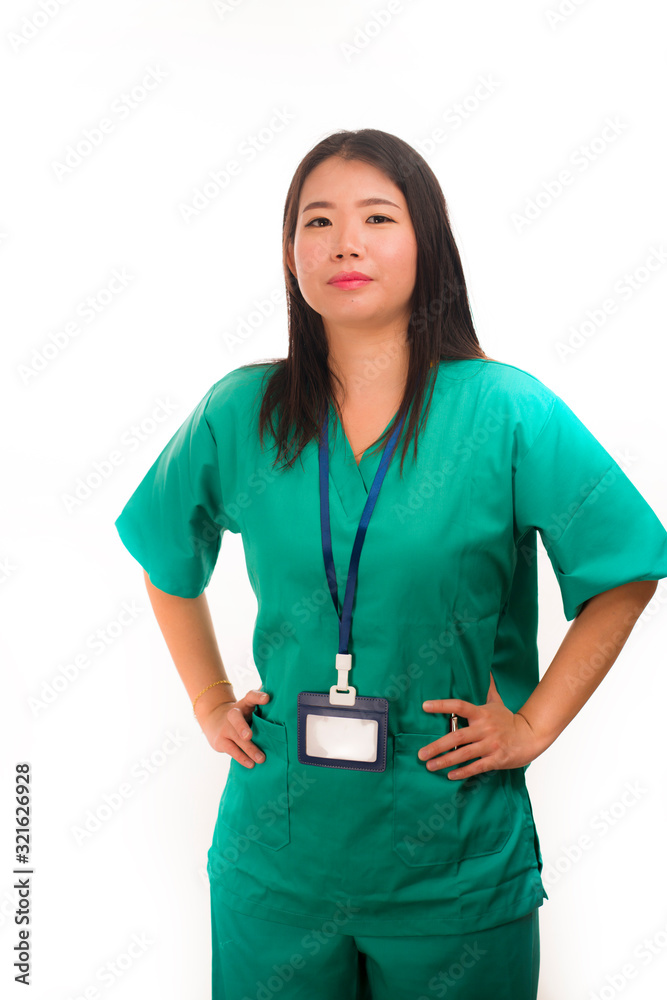 young beautiful and happy Asian Korean medicine doctor woman or hospital nurse in green scrubs posing cheerful smiling confident in corporate clinic staff portrait young beautiful and happy Asian Korean medicine doctor woman or hospital nurse in green scrubs posing cheerful smiling confident in corporate clinic staff portrait