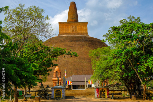 Anuradhapura, Sri Lanka - February 2020:  The Buddhist stupa Abhayagiri Dagoba on February 6, 2020 in Anuradhapura, Sri Lanka. photo