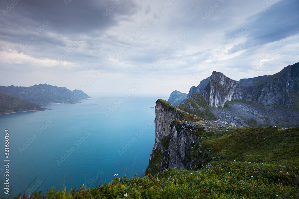 Dramatic cliff of mountains in Senja Island, Norway.