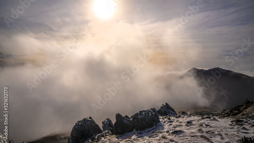 Mount Snowdon with cloud and sunrise from Glyder Each in winter
