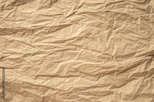 Brown crumpled paper close up texture background