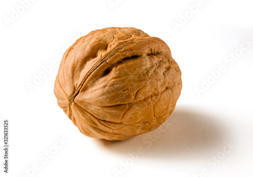 Obraz na płótnie Still life with a whole walnut on white background. w salonie