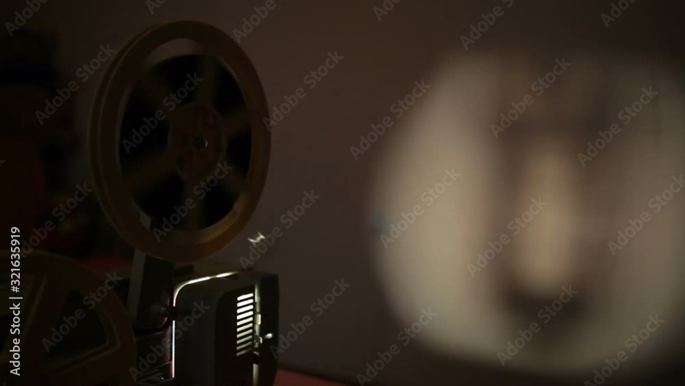 Retro movie projector. Old movie projector for watching 8 mm film films