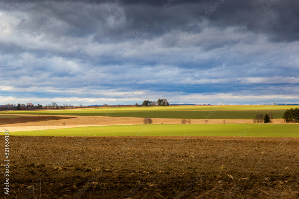 Beautiful snowless landscape in the countryside at winter. Warm day in january. Czech Republic.