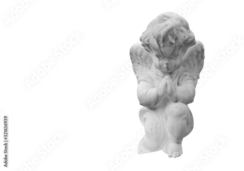 Ancient statue of little angel with wings isolated on white background.