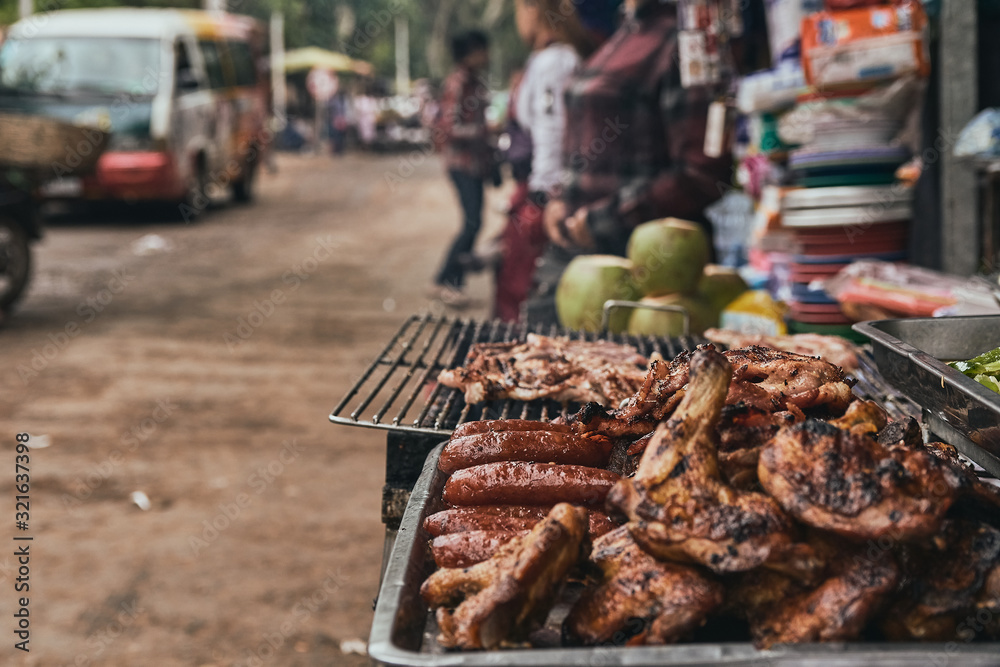 chicken wings in street food market in cambodia