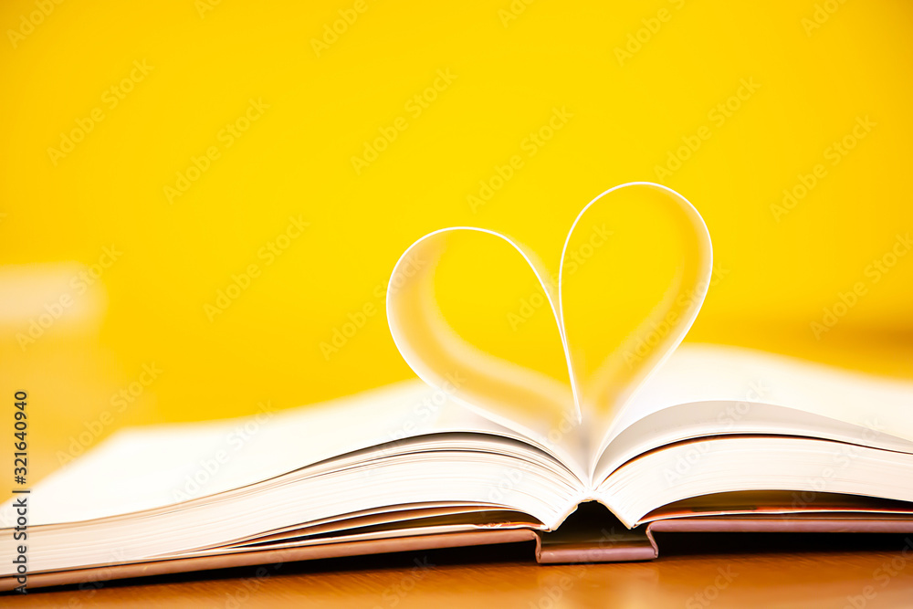 Book in heart shape the symbol of love or February 14 valentine's day for love and happy backgroung.