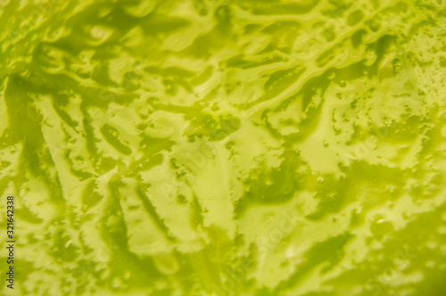 Green pulp of fresh cucumber closeup. Macro photo