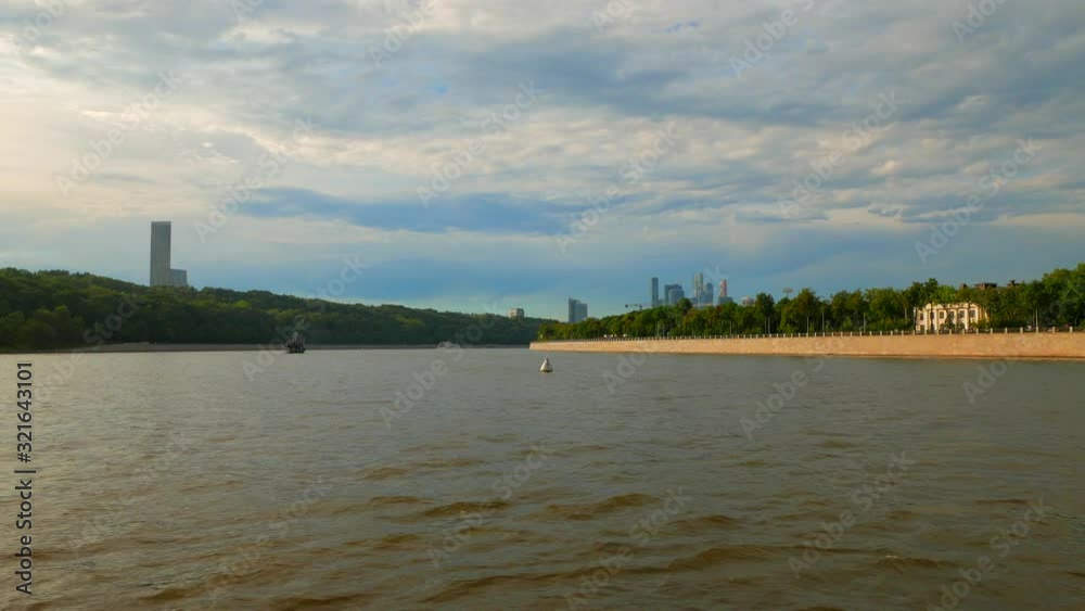 Boat trip. Cloudy summer day. Panorama of the Moskva River in Moscow. Boat trip. Cloudy summer day. Panorama of the Moskva River in Moscow.