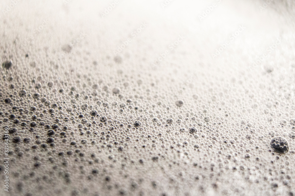 Beer foam with pots close-up. Macro photo Beer foam with pots close-up. Macro photo