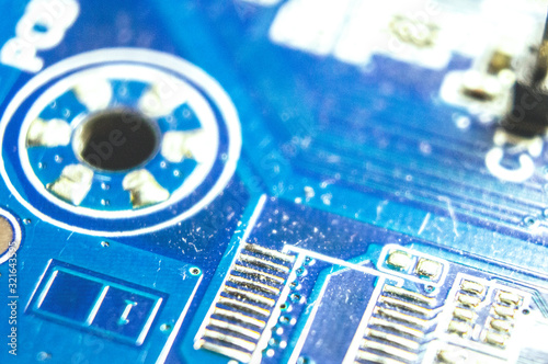 Electronic microcircuit transistors circuit board with diodes close-up. Macro photo