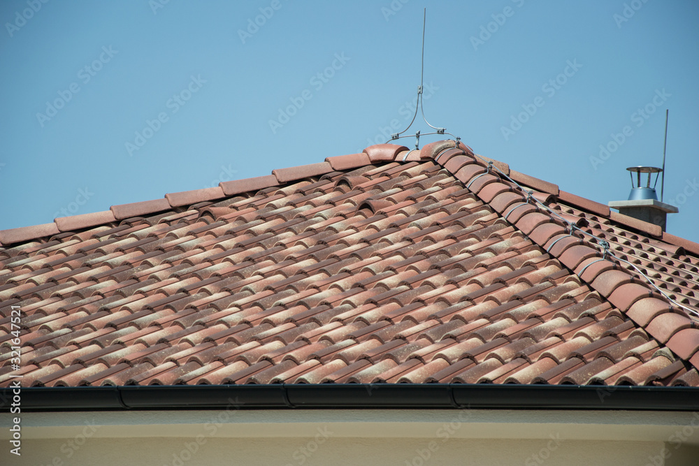 Close up of roofing tiles. Roof of new house. Roof tiles background