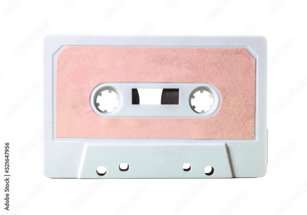 An old vintage cassette tape (obsolete music technology from the 1980s, having a great comeback). White plastic body, empty pink label. Isolated.