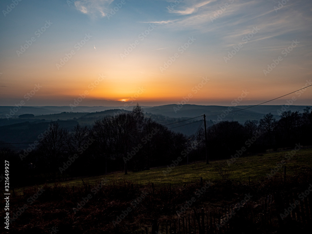 Stoumont, Belgium, 25 January 2020. Sunset over the hills near the Belgian village of Stoumont. Stoumont, Belgium, 25 January 2020. Sunset over the hills near the Belgian village of Stoumont.