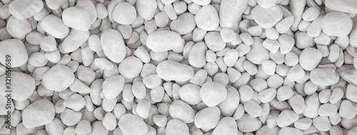 White pebbles stone for background.