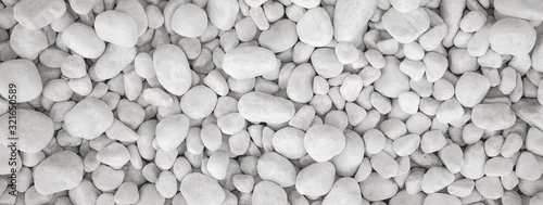 Obraz  z motywem White pebbles stone for background.