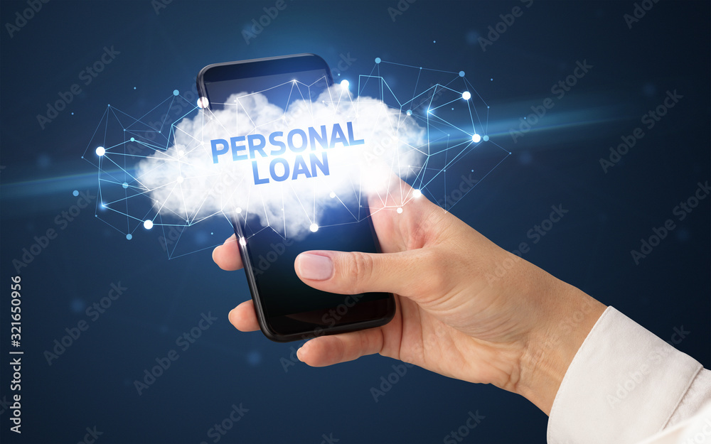 Female hand touching smartphone with PERSONAL LOAN inscription, cloud business concept Female hand touching smartphone with PERSONAL LOAN inscription, cloud business concept