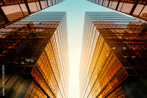 modern office building, sun reflection on glass facade