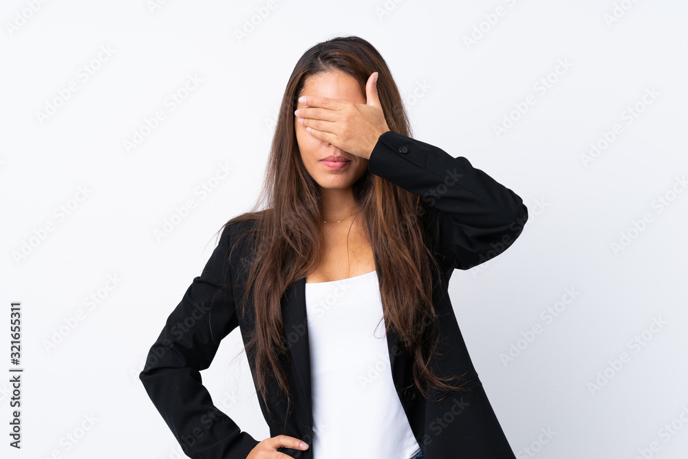Young Brazilian girl with blazer over isolated white background covering eyes by hands Young Brazilian girl with blazer over isolated white background covering eyes by hands