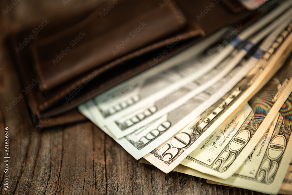 The wallet with dollars. The wallet with dollars.