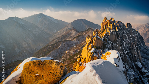 Ulsanbawi rock formation covered in snow in winter in Seoraksan National Park photo
