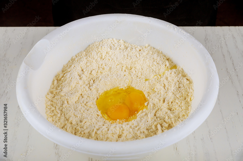 Ingredients of cookie dough egg, sugar, butter and flour. Ingredients of cookie dough egg, sugar, butter and flour.