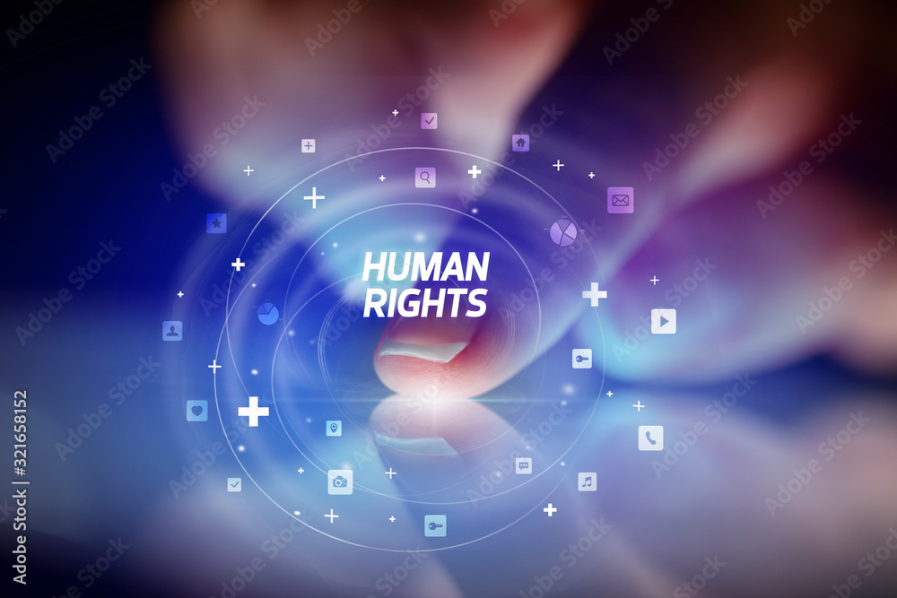 Finger touching tablet with social media icons and HUMAN RIGHTS