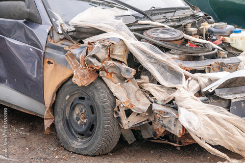 Crashed car without bonnet cover