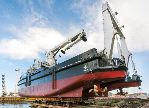 Fotografie, Tablou Modern ship in the shipyard getting ready for launch