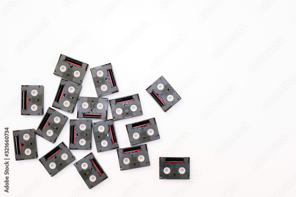 Vintage mini DV cassette tapes used for filming back in a day. Random pattern made of plastic