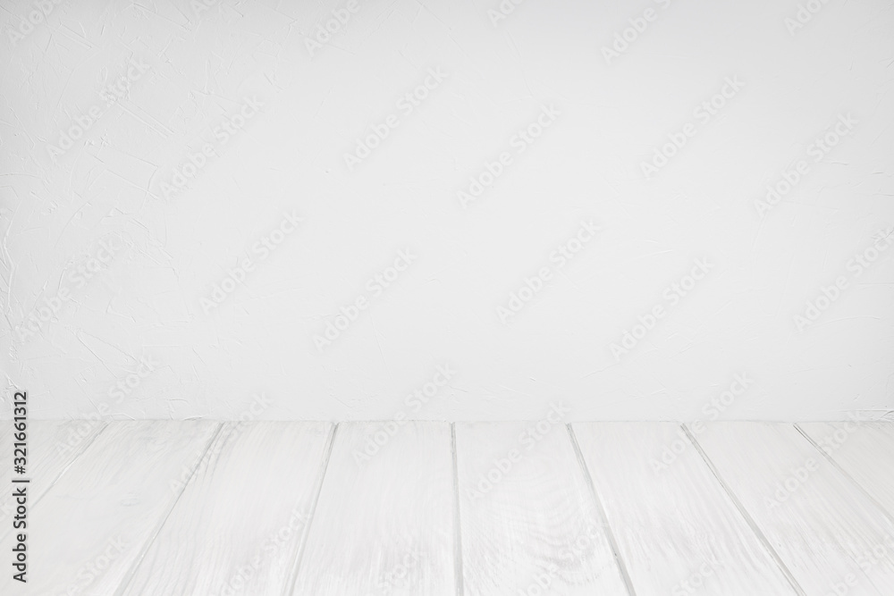 Empty Wood Table On white washed Textured wall. White background for composition. Copy space Empty Wood Table On white washed Textured wall. White background for composition. Copy space