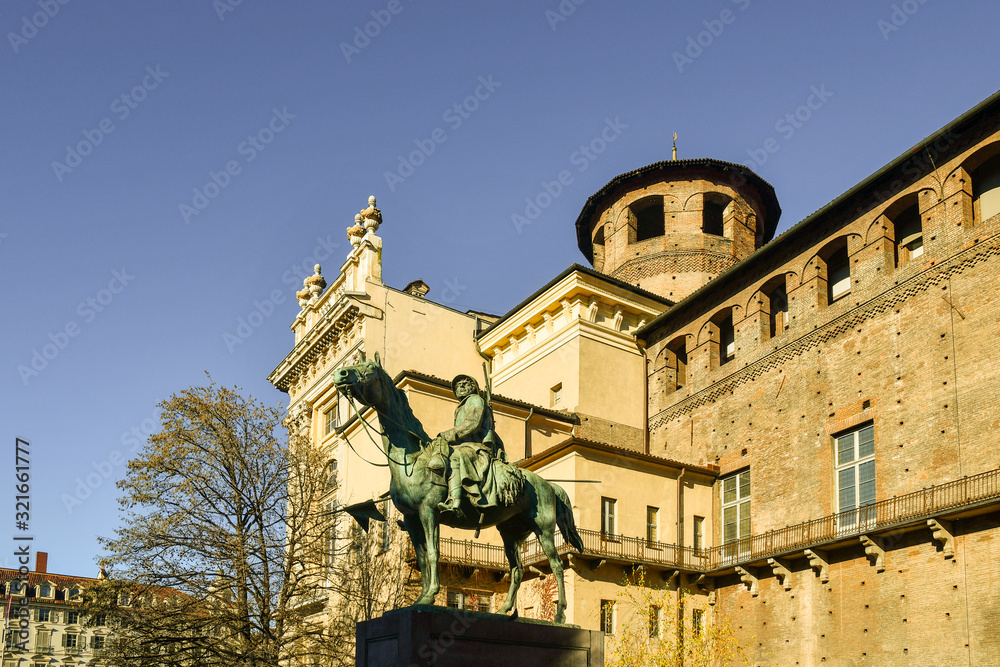 Monument to the Knights of Italy (1923) by the sculptor Pietro Canonica on one side of Palazzo Madama palace and Casaforte of Acaja fortress, Turin, Piedmont, Italy