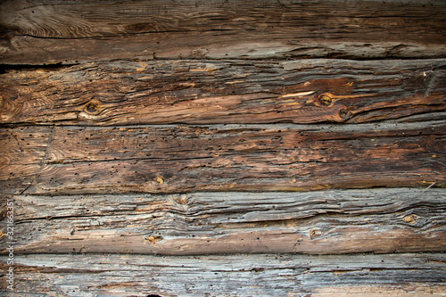 Old wooden timbered wall of a house