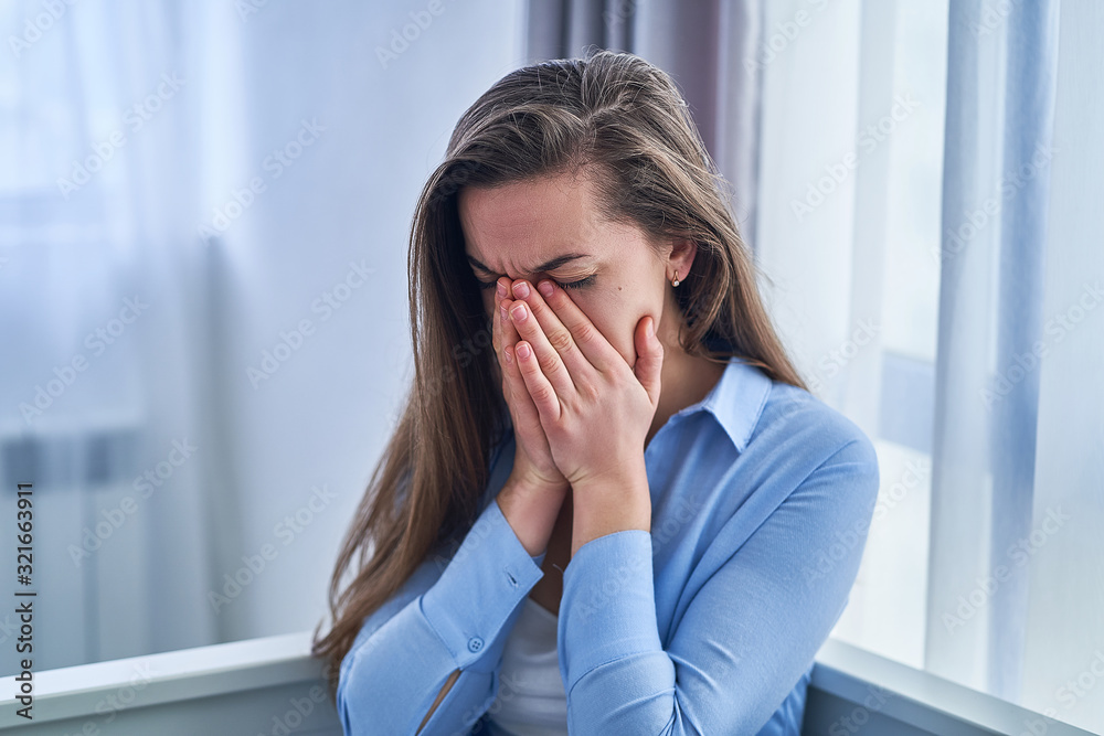 Sad lonely crying woman with life difficulties and mental emotional problems during depression Sad lonely crying woman with life difficulties and mental emotional problems during depression