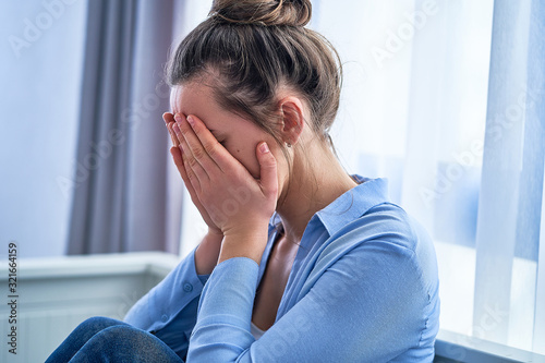 Upset crying woman with life difficulties and emotional problems during depression. Mental health