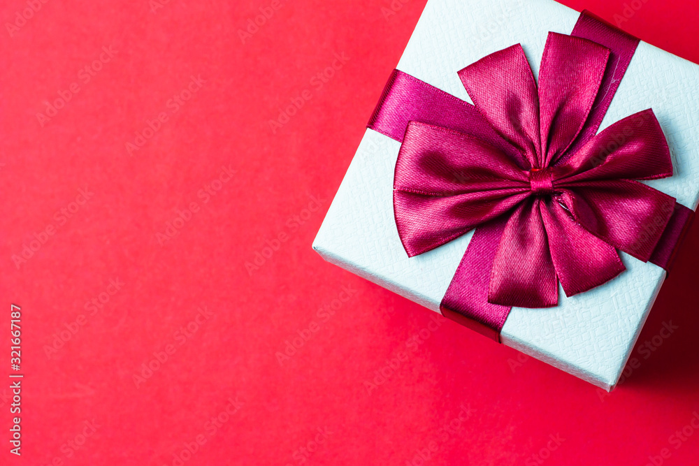 Gift boxes and hearts on a red background Gift boxes and hearts on a red background
