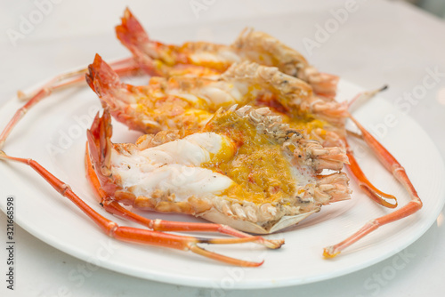 Grilled river prawn on white plate