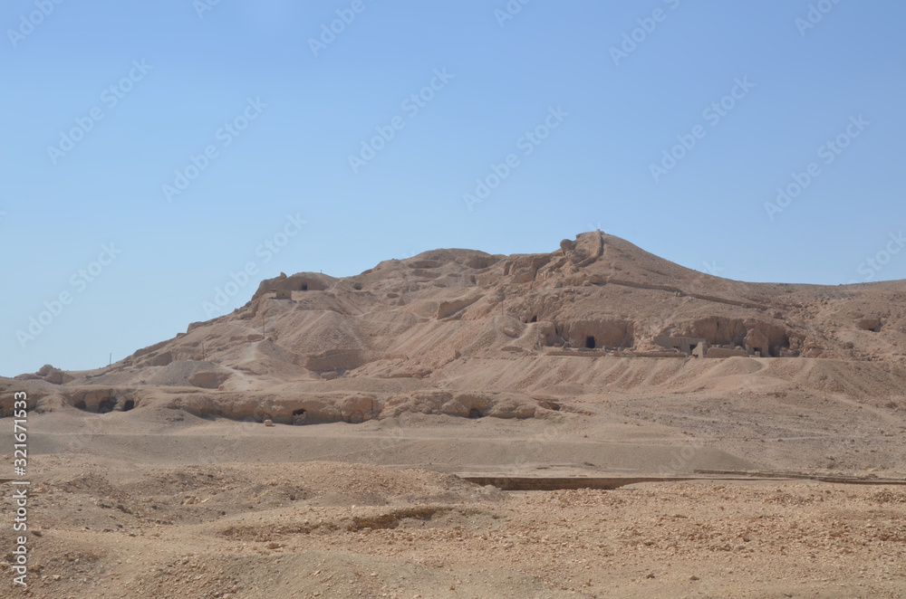 The Mortuary Temple of Hatshepesut, also known as the Djeser-Djeseru, is a mortuary temple of Ancient Egypt located in Upper Egypt. Desert and ruined area around the temple. The Mortuary Temple of Hatshepesut, also known as the Djeser-Djeseru, is a mortuary temple of Ancient Egypt located in Upper Egypt. Desert and ruined area around the temple.