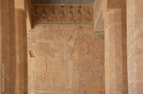 The Mortuary Temple of Hatshepesut, also known as the Djeser-Djeseru, is a mortuary temple of Ancient Egypt located in Upper Egypt. Well-preserved Egyptian hieroglyphs. © peacefoo