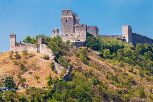 Fortress of Assisi, in Italy. Landscape view of the Rocca Maggiore. Medieval fortification to protect the city of Assisi. photo