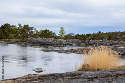 Rocky coastal view in spring, Foglo, Aland islands, Finland photo
