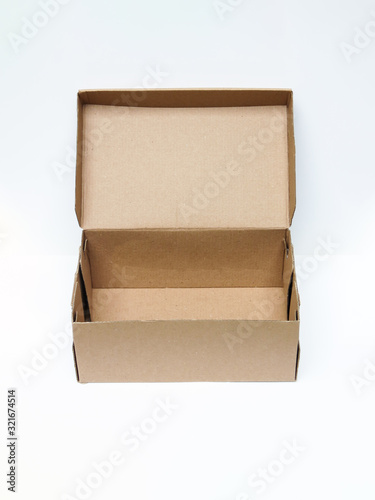 Open Empty Cardboard Box Isolated on White Background. Cardboard Box isolated on a White background © Fuad