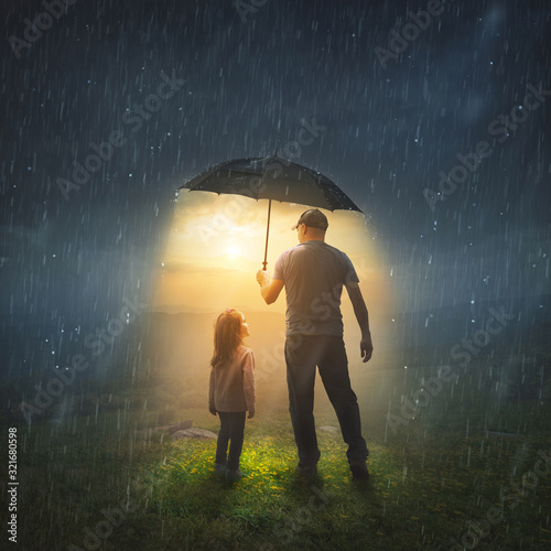 Father and Daughter in the Rain photo