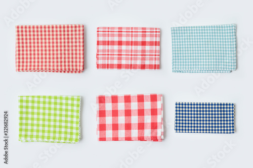 Fototapeta Naklejka Na Ścianę i Meble -  Checked tablecloth collection on white background. Cooking or baking mock up for design. Top view from above