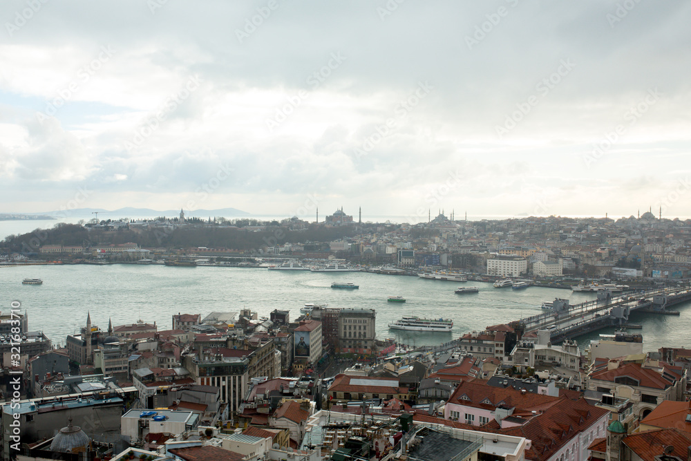 View of Istanbul from the Galata tower on bridges to the Bosphorus Bay January 2020