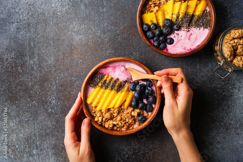 Asai bowl granola oatmeal with mango, blueberry and chia seeds photo