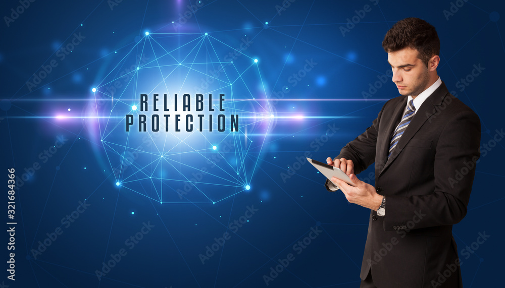 Businessman thinking about security solutions with RELIABLE PROTECTION inscription Businessman thinking about security solutions with RELIABLE PROTECTION inscription